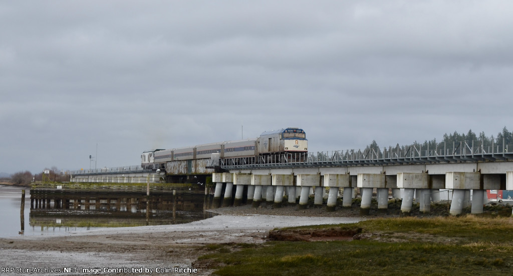 AMTK 90250 heading S/B across the Crescent Beach Marina swing bridge with a short re-certification train and trailing Amtrack 1406.